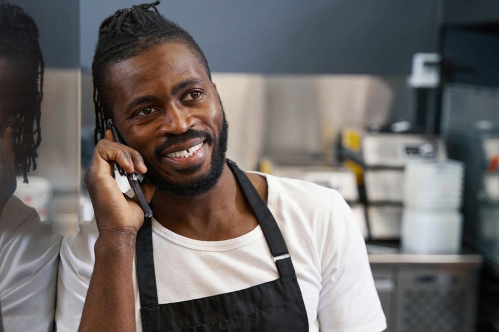 Chef talking on the phone at work